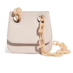 Cream house of want crossbody bag.  Fabulous vegan and plastic strap bag.